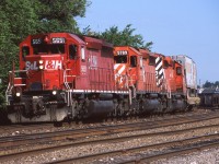 Like clockwork CP 122 rounds the bend at Streetsville Junction with a typical trio of SD40-2s up front. In my books it was always nice to get an STL&H up front, even if the lettering was too big to fit on the short hood. 