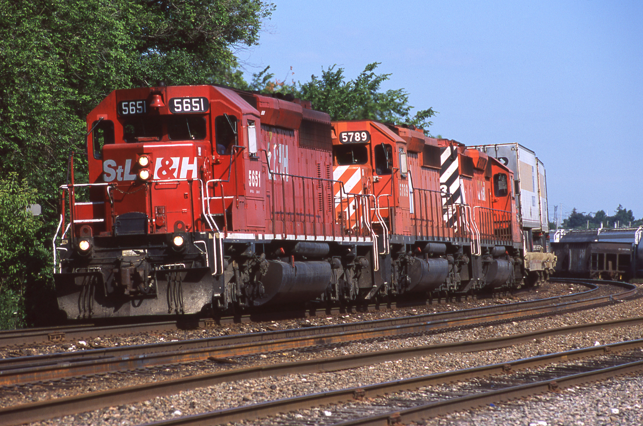 Like clockwork CP 122 rounds the bend at Streetsville Junction with a typical trio of SD40-2s up front. In my books it was always nice to get an STL&H up front, even if the lettering was too big to fit on the short hood.