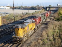 2021.11.09 CP 234-08 lifted 244-06 and 244-07 light powers from Wolverton Yard, made this huge lash up. CP 8877 leading CP 234-08 light power, BNSF 4705 fakebonnet, CP 9367, CP 7020 military unit, CP 8772 and UP 6562 trailing. At Agincourt Yard.