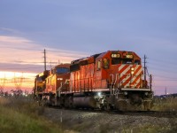 2021/11/11 CP 6013 leading CP 8-420, CP 8759 and KCSM 4736 trailing. Working at Vaughan Intermodal Terminal to drop off a cut of stacks.