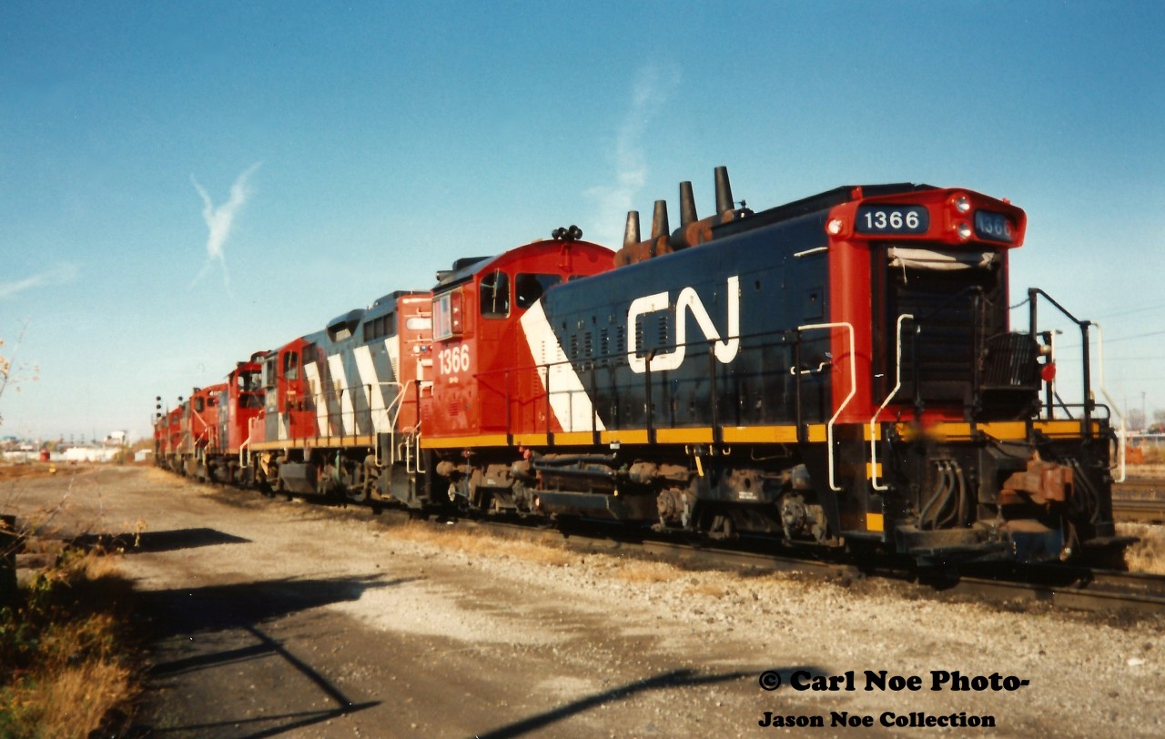 The units seen on the shop track in London, Ontario during an early fall morning included; GP9RM 4104, SW1200RS 1360, GP9RM's 4130 and 4110 as well as SW1200RS 1361, GP9RM 4141 and SW1200RS 1366. Both 1361 and 1366 had been freshly painted in the railway's CNNA colors at the time.