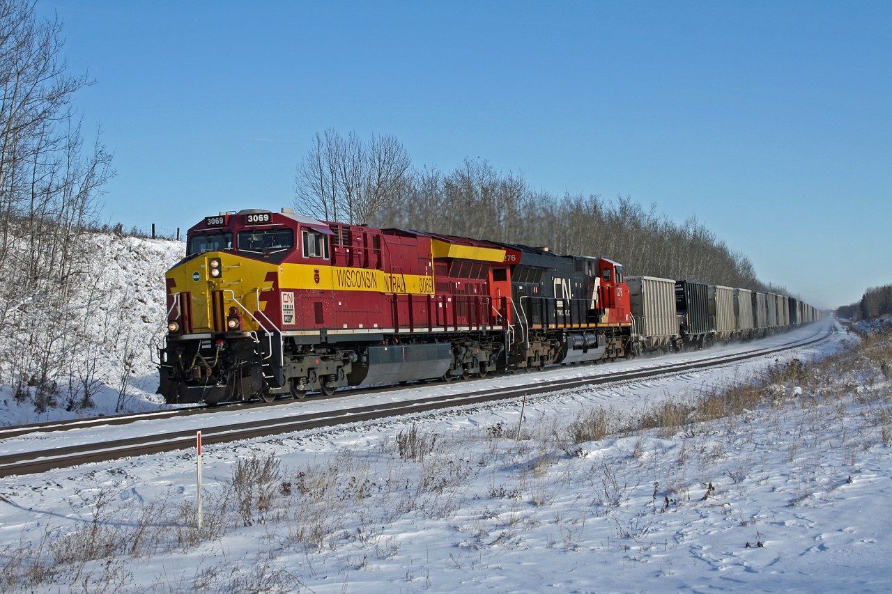 Edmonton to Cadomin U 72551 17 highballs through Stony Plain, one day after the first major snowfall of the year.  724/725 operate between the Cadomin Agregate Mine on the Mountain Park Spur, south west of Edson, Alberta and the Leigh Cement power plant at Bissell Yard.  

Seeing the WC Heritage unit brings back fond memories of shooting WC SD40s and SD45s back home in Ontario.  But I must be getting old, because that was almost 15 years ago!

https://youtu.be/smIINvv--A0