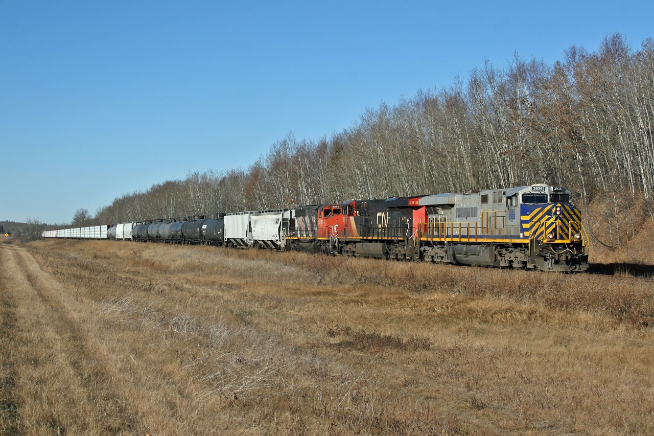 After meeting Z 11531 28 at Uncas, M 31251 30 is underway again with CN 3936, CN 2918 and CN 5276