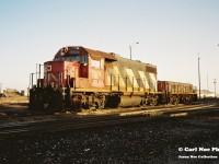 CN GP38-2m 7501 and HBU-4 510 are seen taking a break from hump duties at CN’s MacMillan Yard diesel facility during an early winter afternoon.