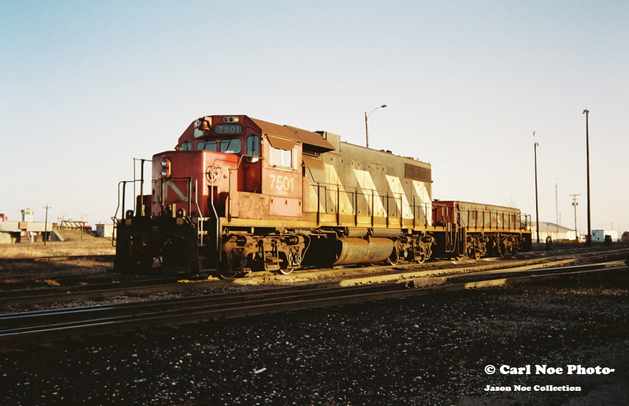 CN GP38-2m 7501 and HBU-4 510 are seen taking a break from hump duties at CN’s MacMillan Yard diesel facility during an early winter afternoon.