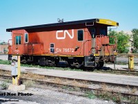 In early morning light, CN transfer van 76672 is viewed sitting at the car repair area of CN’s London yard. This caboose had sat here from late summer until early fall that year before departing to an unknown destination. 