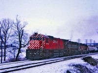 Extra West, with CP 4744 - 8780 and trailing leased unit B&LE 822. A cruddy winter afternoon near Campbellville and a Kodak Instamatic memory.