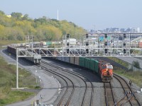 CN 305 has lumber and aluminum up front as it changes crews at Turcot Ouest.