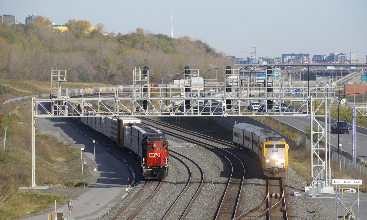 VIA 35 with VIA 907 and a HEP consist is passing two GP38-2's and cars that were on a CN 401 that had issues and was left on Track 29 for a couple of days.