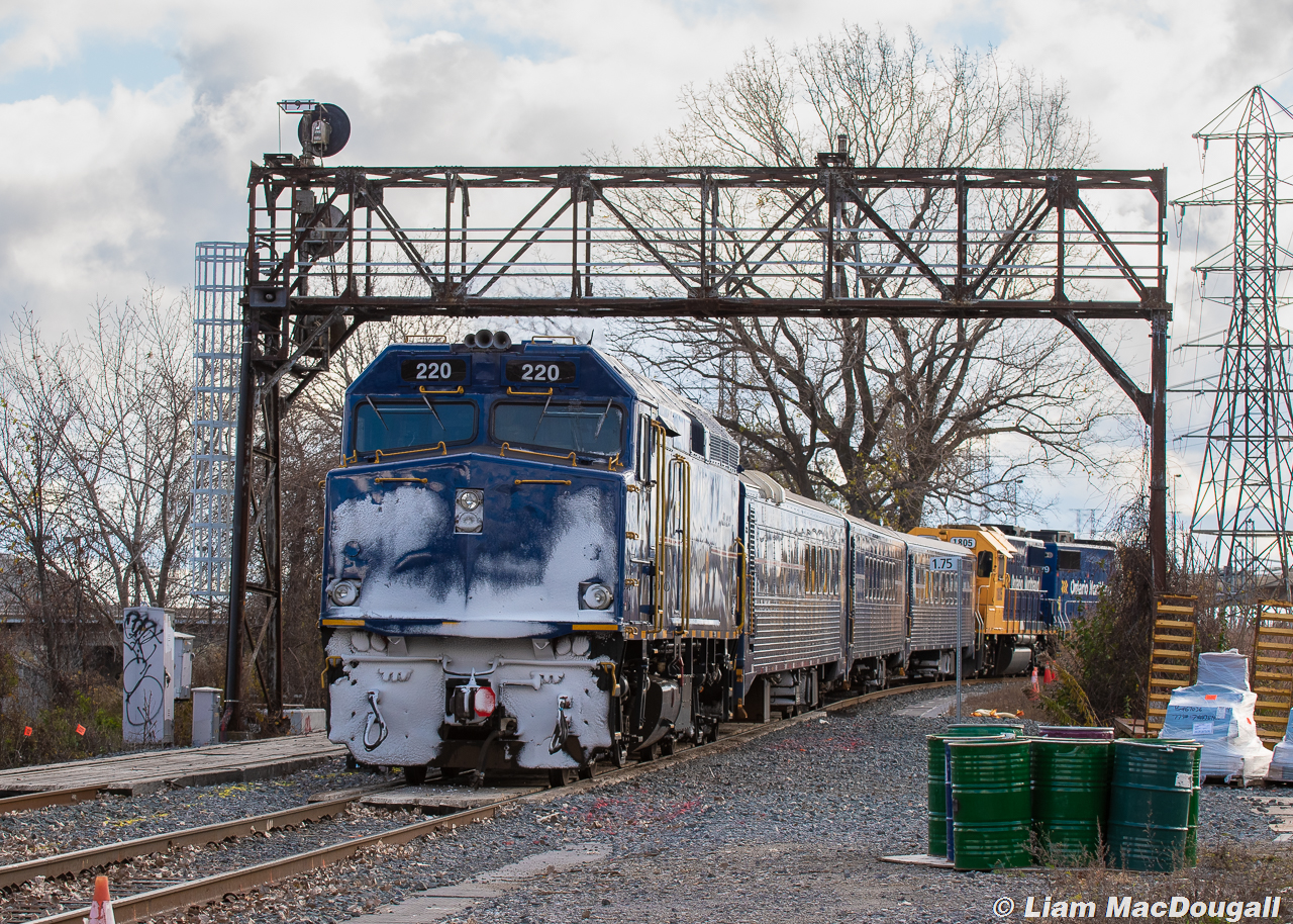 As Ontario Northland's "Northlander" test train has just entered the Union Station Rail Corridor, ACPU #220 (former Amtrak F40PH) slips under one of the remaining 1930s-era signal bridges slated for replacement in the very near future. It was quite a treat to be able to get out and catch this rare movement, and might end up being the last time any ONR equipment passes under these classic relics unless they plan on doing more tests in the next few months.