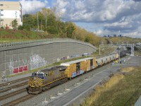 After changing crews and letting VIA 62 and VIA 67 pass, CN 305 is on the move from Turcot Ouest. Leading is an ex-Citirail unit, a quite common sight in Montreal recently.