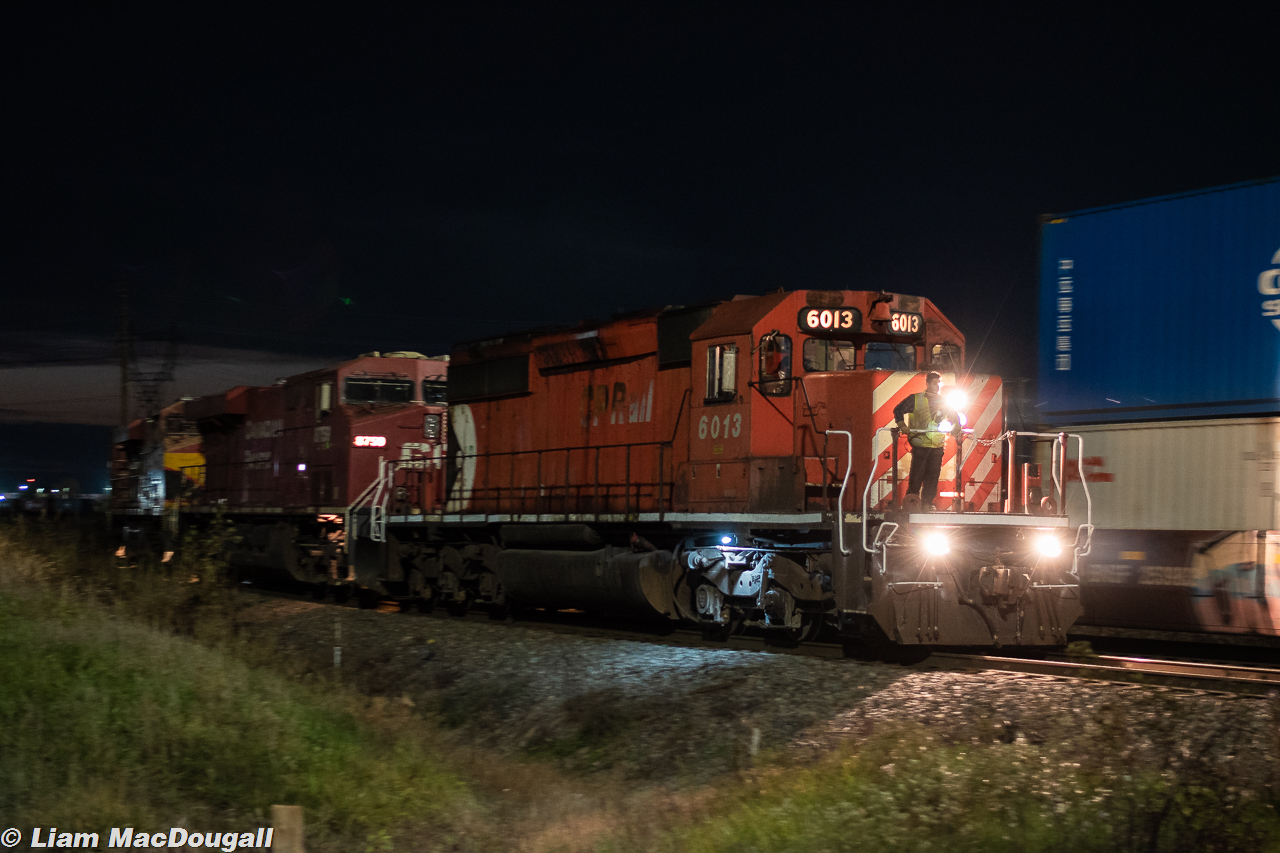 CP 8-420-10 is seen here on their way out of Vaughan after dropping a hefty cut of stacks. Leading is a venerable GMD SD40-2, commonly seen leading regular trains on the Mactier as recently as 2013, but now an extreme rarity on anything other than a work train. I believe the only reason this particular train had one on point was due to the conductor’s side windshield being cracked on the trailing unit, CP 8759. Additionally, the symbol 8-420 is one I’ve never seen before, nor have I ever seen a 420 with traffic for VIT. All kinds of oddities happening here!