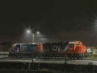 A Hamilton yard set working the 1500 job pauses under the flood lights on one of the yard leads while the crew takes lunch.  They will be back to work shortly after to 1600 job returns from the hole.