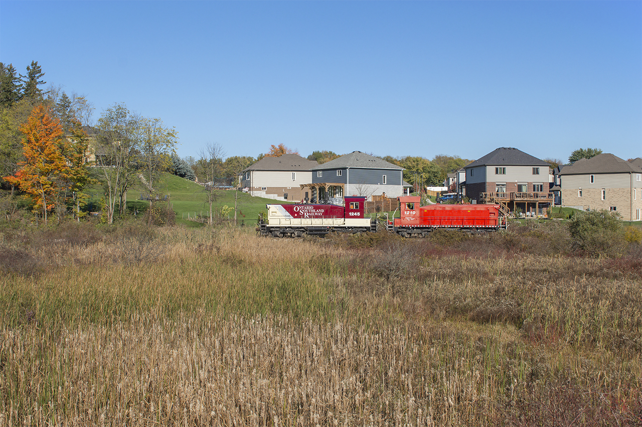 Their work in the Railway City done for the day, OSR pups 1210, 1245 return down the Tilsonburg Spur headed back to the barn at Salford.