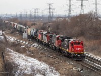 CN M394 hits approaching the Weston Road overpass with quite the lashup!