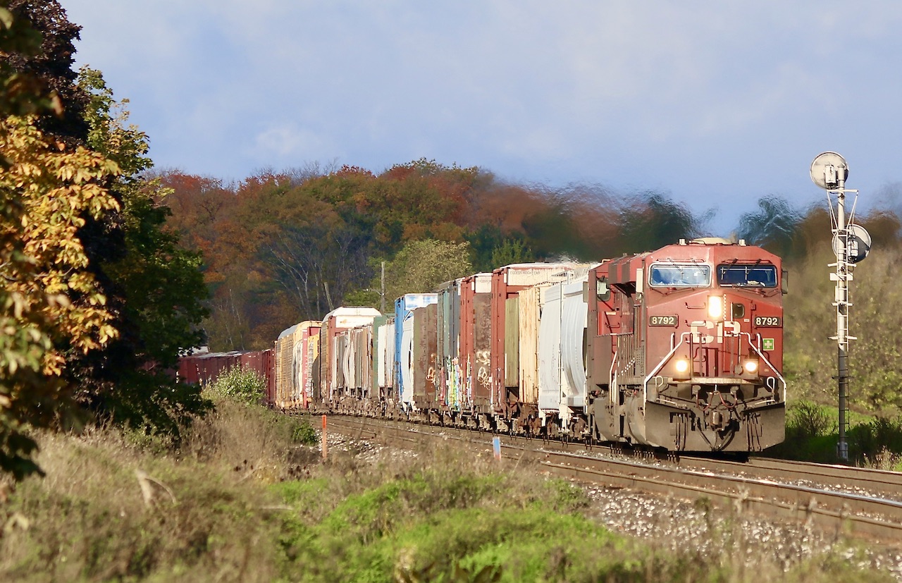 The slight grade at Meadowvale makes for a dramatic image as far as heat waves go, as CP 234 rolls eastbound. While the motive power is barely moth a second place, at least the scenery kind of made up for it. So far the searchlight signals protecting the ends of the GO platforms here have been able to dodge replacement by newer LED signals.