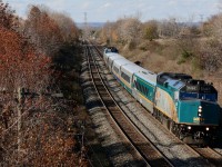 My trips to the Newtonville area are not what they once were. My younger railfanning years are full of so many good memories of spending hours with railman friends at so many of the old wooden bridges Wirth great scenery and interesting motive power from all railroads. Today VIA traffic seems to dominate most trains on most trips with little variety, while the scenery is still beautiful, many of my old haunts are now gone with the removal of a number of old bridges along the line. Time rolls on and one has to make the most of what is handed to them. It seems that today many of the trains rolling through the area are dominated by 1+1 DPU consists. In this case even the VIA train almost looks like a DPU set up, but obviously not the case. Stephenson Road is still a favourite location for me and my boys when in the Newcastle/Lovekin area. The fading autumn colours certainly helped make the shot.