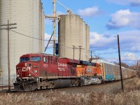 The BNSF 25th anniversary engines are certainly impressive, especially considering the effort CN put in for its 100th, LOL. The BNSF scheme certainly stands out in the crowd though I do miss the original logo over the "swoosh". Hearing that 6179, one of a group of 25th anniversary units had made it into Ontario was certainly enough to make rail fans take note. I missed its eastbound trip, and figured it would head west last night on 141, but as luck had it the unit lasted long enough to head out in daylight on 147. Here the clean GEVO is seen trailing CP 8771, as it rolls past the Ardent elevator in Streetsville under decent light.