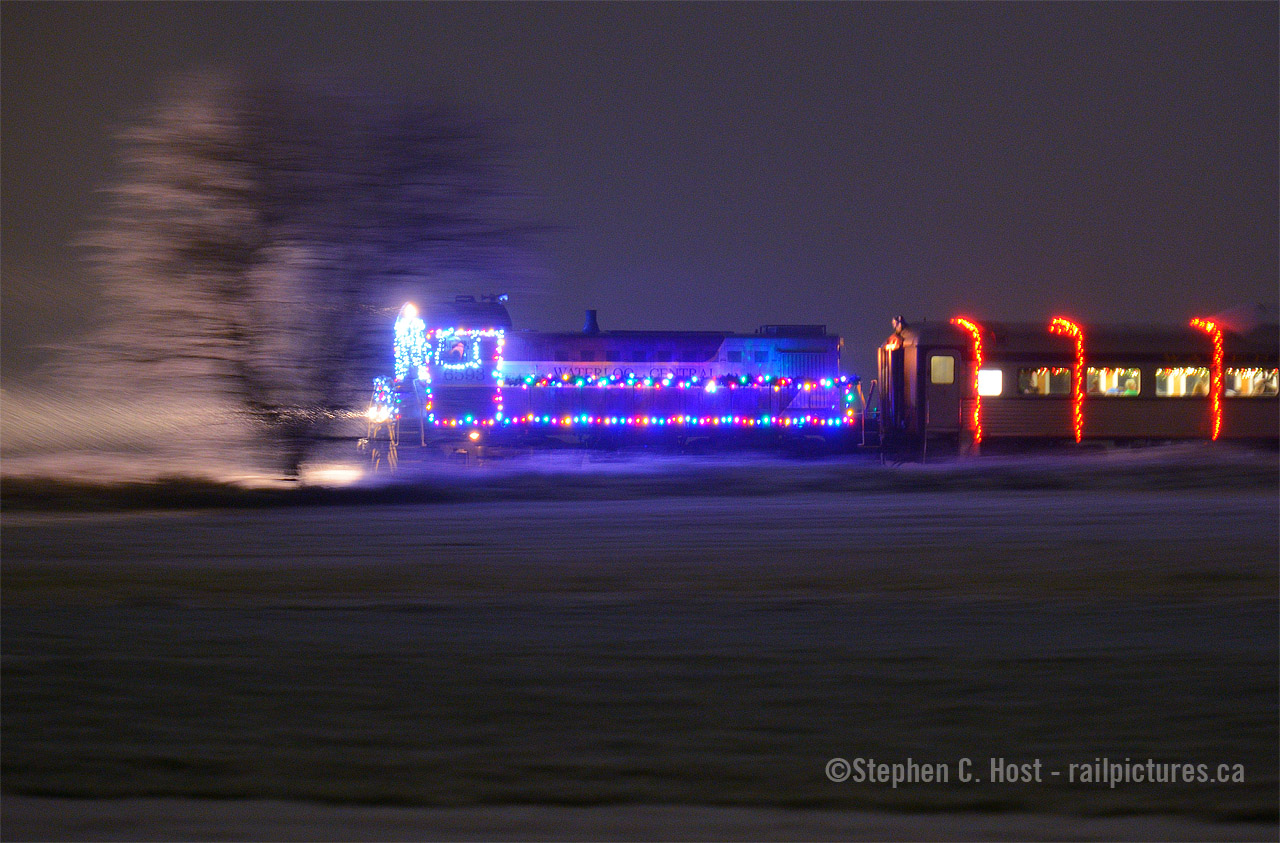 With headlights casting a beam in the light falling snow, and everything covered in white, we have the perfect conditions for a Santa Train in mid November. WCR's S-13 1001 is blasting through the fields of Woolwich Township heading to the "North Pole" to pick up Santa where the kids and adults of all ages enjoy the ride. Folks, plenty of time to get your tickets and bring your young ones, if my kids were 3 years younger we'd be all over this, but we've aged out already :) Tell your friends, the volunteers at the WCR have put on an amazing display sure to delight any children or grandchildren 'Santa' age. For tickets see their website, waterloocentralrailway.com. Plenty of tickets available, especially the Sunday runs. The night runs are VERY special because they have lit up displays all along the line - again, for those with young kids/grandkids don't miss this.