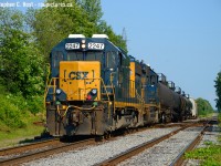 With 2020 vacation to be used up in 2021 my family and I decided to see sights in the Montreal area. Poutine, french cuisine and culture, museums, family history (!) and for me, trains. I had very little time for trains. I had always wanted to bag CSX in the Montreal area having been a 'fan of the CSX in the Sarnia region, and with CN circling to buy it time is not on my side. I had one chance - to bag it on my way into town,  and I lucked out. Pictured here is what I found, B783 setting off cars in the CN-CSX interchange near Cecile Jct. This is CN track, former Canada Atlantic Railway (Depot Harbour through the bush/Algonquin to Cantic) that is now abandoned not far from what you see here toward Cantic. Assuming CN is successful in taking over the CSX Massena line into Montreal, I expect this kind of interchanging will end as CN can just take it direct.<br><br>A nice change for me is bagging something other than GP38-2's in Canada, which is basically all CSX in Ontario had until <a href=http://www.railpictures.ca/?attachment_id=46300 target=_blank>very recently.</a> This pair was a <a href=http://www.railpictures.ca/?attachment_id=46302 target=_blank>  Road Slug (a former GP35) and a GP40-2</a>
