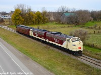 I love to head to OSR on Saturdays in late fall when the propane flies (November) because it's usually quiet and you can do some <a href=http://www.railpictures.ca/?attachment_id=45454 target=_blank>Branchline Railroading</a>. Upon arrival in Salford yesterday there was nothing, no crew cars in the lot so I knew nothing was running. Dismayed, I hung around doing other things, but later in the morning the crews arrived. Imagine my surprise upon inquiring that the Business Train was scheduled to run, instead of propane, for reasons I did not yet know, and I was filled in on as we waited for the special guests to arrive. (The propane is running today, November 21, instead)<br><br>As alluded in a <a href=http://www.railpictures.ca/?attachment_id=47178 target=_blank> prior photo</a> I had met and known Jim only in the last few years, many in our community or who have bought books on Steam have seen his work in countless publications over the years. OSR 6508, now known as the "James. A. Brown" is pictured leading the business train while friends and family share the moments as they pass through Putnam. His name is tastefully added just below the window on both sides of 6508 as Jim had a direct hand on this unit ending up on the OSR for countless photographers to enjoy, aside from his numerous other Railroad preservation efforts. Thanks, Jim!