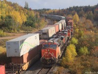 Oct 15th @ 10:17, A407, all intermodal out of Rockingham yard, finally takes the siding at Springhill Jct, NS to meet Z120, which had been waiting at a red signal for almost 30 minutes. 446 axles with CN 2911, CN 2837 and CN 3816. The siding (second longest between Moncton and Halifax) is 11,350 ft. Z120 is 12,806 feet, and A407 is 9,732 ft. You do the math.