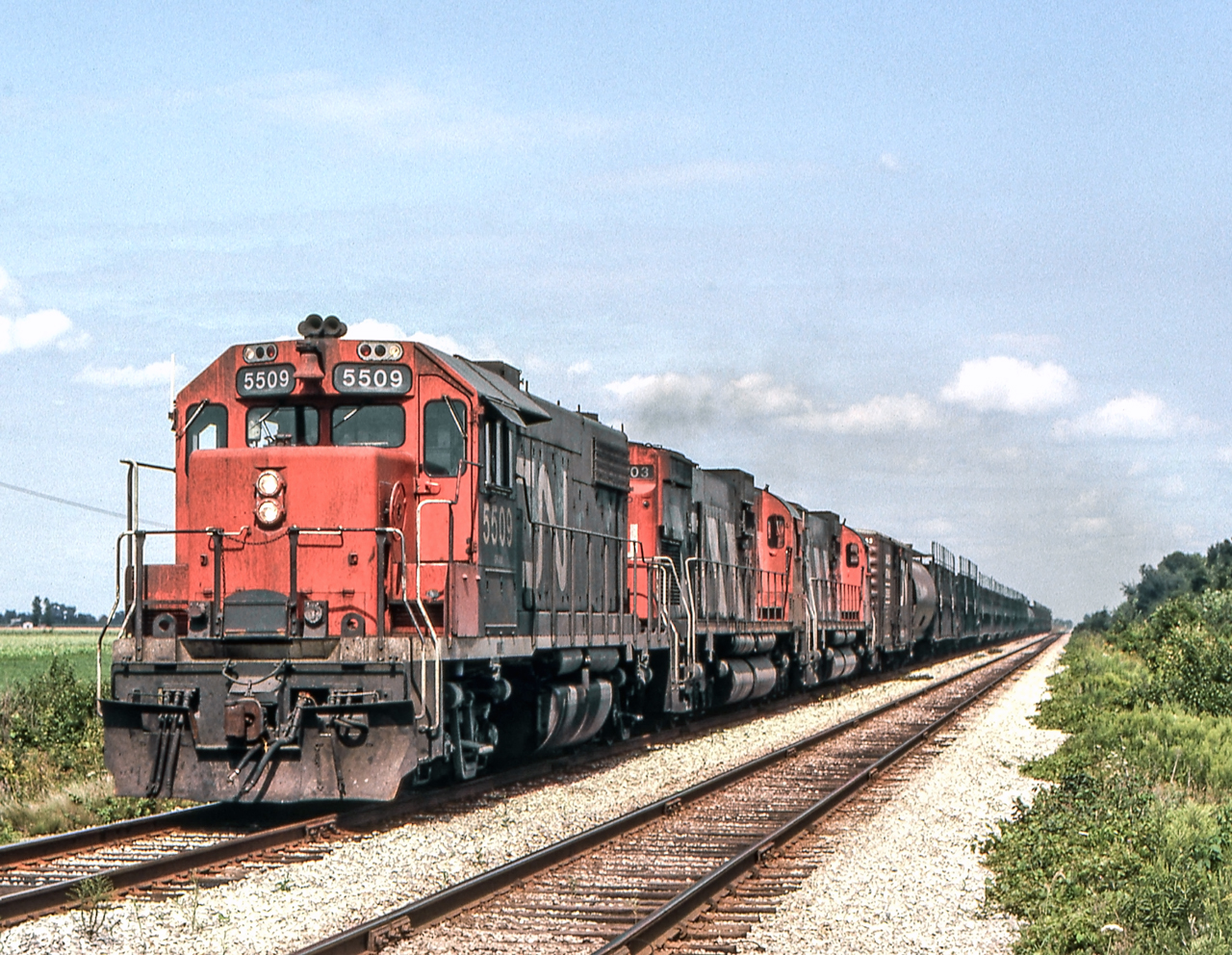 CN 5509 is at Prairie Siding near Chatham, Ontario on August 12, 1982.