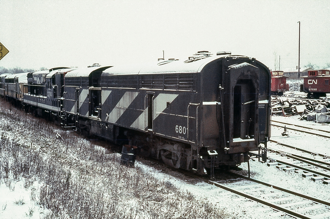 The hulks of CN 6801, 2214, and other CLC locomotives are in the CN Reclamation Yard in London, Ontario on November 30, 1968.