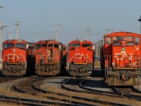 A little bit of CN variety sits next to the diesel shop in Saskatoon Yard. Personally I'll take the one on the right to work with or photograph.  