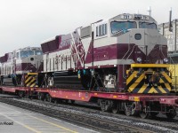 In December 2006, GEXR 432 has some export units from London's EMD plant in tow labelled as "EF Carajas". The units were bound for Brazil, if I recall correctly, and did not have trucks under them. Loads like these were common on GEXR when the EMD plant was still producing locomotives. 