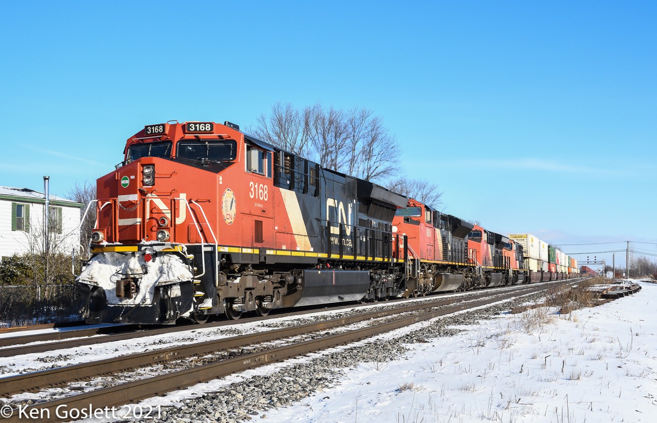 On a sunny December morning an extra stack train heads for Toronto.