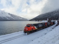 Between intermittent snow squals, M 34851 26 skirts the shore of Moose Lake, on CN's famed Albreda Sub