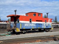 I thought this was worth sharing as BC Rail cabooses (cabeese?) are a rather rare breed these days. I checked the Trackside Guide and found only 6 remaining. This one was on the south side of the yard opposite the Quesnel station (out of view) and it was interesting most of this yard was fenced. Fortunately, a road gate was open and I slipped in and grabbed this shot from the car.
Wondering what the 'holes' in the body are for, seen above the "BC". Former Expo 86 emblem? Anyone know ??