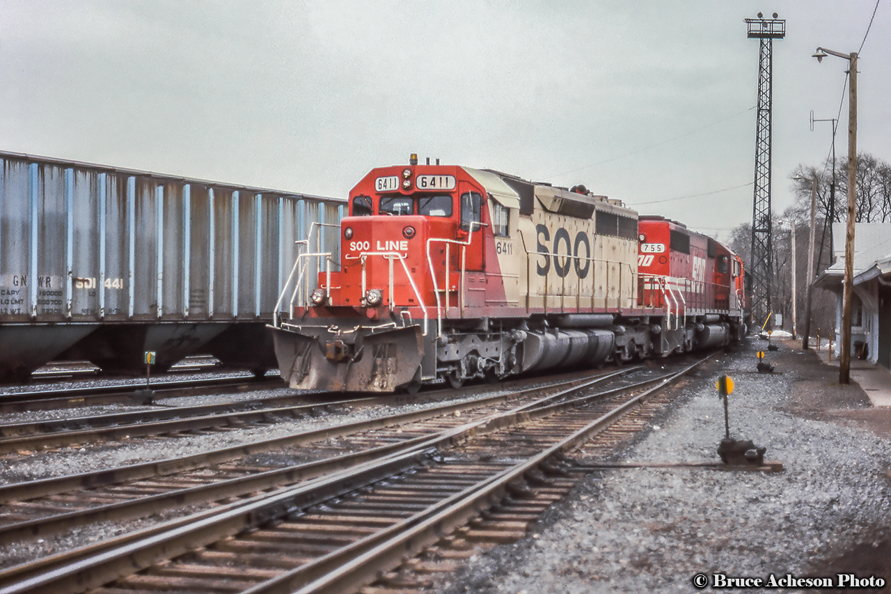 Power for the rock train moving about Aberdeen Yard.  Note TH&B depot at right.