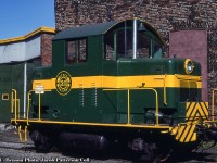 Snapped at the Glace Bay roundhouse, DEVCO 20, one of only 11 EMC Model 40 300hp locomotives constructed.  Built in August 1940, serial number 1134.  Originally EMC #10, used at Plant #2, South Chicago, for use as their <a href=http://www.northeast.railfan.net/images/emd1134a.jpg>shop switcher and demonstrator,</a> it made it's way to Canada in May 1951 as McKinnon Industries #10 at the St. Catharine's plant, now GM.  The loco would be sold to dealer Andrew Merrilees in 1963 where it would briefly be leased to Lake Ontario Steel in 1965.  After which it would head east to the Four Star Colliery at Broughton, Nova Scotia as their #10.  It would finish its career with Devco as #20 starting 1969, and finally to the <a href=http://www.trainweb.org/oldtimetrains/photos/shortline/Devco_20P.jpg>Museum of Industry in Stellarton, NS,</a> in 1991. Information per Colin Churcher’s archives.<br><br>A 1976 shot of 20 still wearing its <a href=http://www.northeast.railfan.net/images/devc20.jpg>McKinnon Industries paint scheme.</a><br><br><i>John C. Benson Photo, Jacob Patterson Collection Slide.</i>