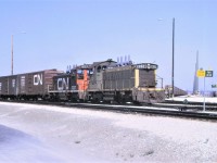 One of CN's many transfer jobs heads out of the West Departure Yard.  Power for the train is a pair of SW1200RS units in the form of 1392 and 1227.