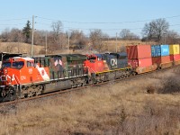 123 rounding the curve at Garden Ave this morning with CN 3233, and CN 8101 showing the way. They had 112 cars in tow