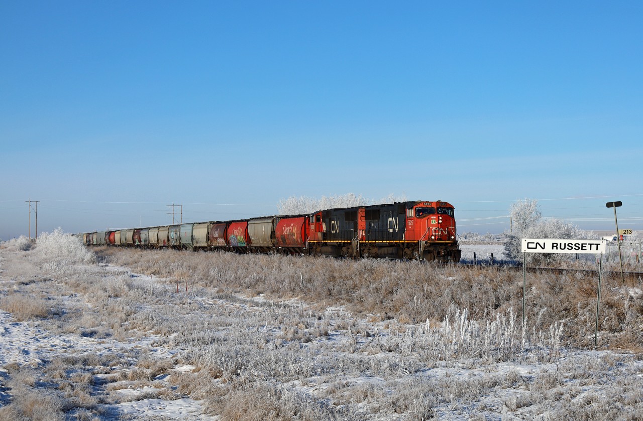 G 80652 14 eases down the siding track at Russett with a pair of veteran SD70I; CN 5625, CN 5609