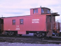 One of the original "end of train" devices, not usually equipped with a flashing device, but often a waving device, rests on the old icehouse track at Capreol, Ontario in October 1966.  This paint scheme is rather unique.