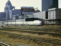 One of CN's original Turbo sets heads out of Toronto Union Station for Montreal as train 68, the afternoon Turbo.  Train 64, the Bonaventure, waits in the background for its departure time.