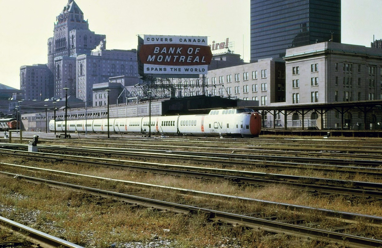 One of CN's original Turbo sets heads out of Toronto Union Station for Montreal as train 68, the afternoon Turbo.  Train 64, the Bonaventure, waits in the background for its departure time.