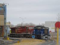 A GMD-1 is shoving CP 8531 into the shops at CAD on a gloomy afternoon. JLCX 1204 was built as CN 1070 in 1960 and was later renumbered to CN 1170 before being retired by CN in 2005. CP 8531 is a 1998 product of GE's Erie shops.