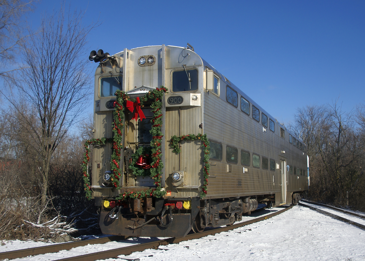 Cab car AMT 900 is decorated for its use in Exporail's Christmas Train as it heads to Des Bouleaux Station on the first run of the morning. The gallery cab car was donated to the museum earlier this year.