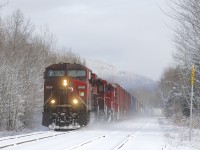 CP 251 rounds a curve in Bromont as it passes the siding located there with a dirty GE leading.