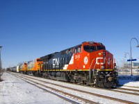 CN 368 is heading east through Dorval with CN 3161 leading and two new QNSL AC44C6M's trailing (QNSL 432 & QNSL 433). These were rebuilt at the Erie plant from BNSF Dash9's.