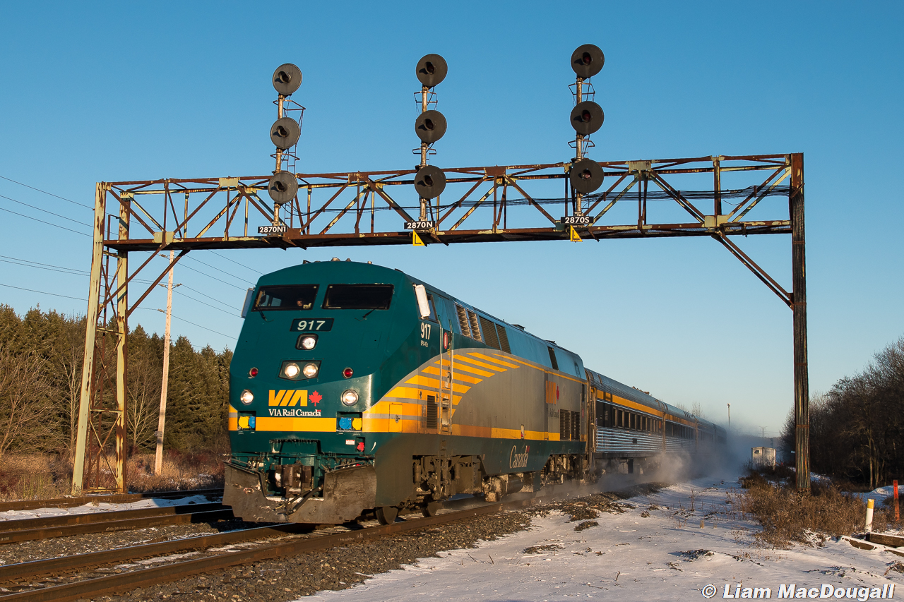 Some gorgeous evening light sets the scene for VIA 917 as it flies through the CN Clarke searchlights in the lead of VIA 53.
