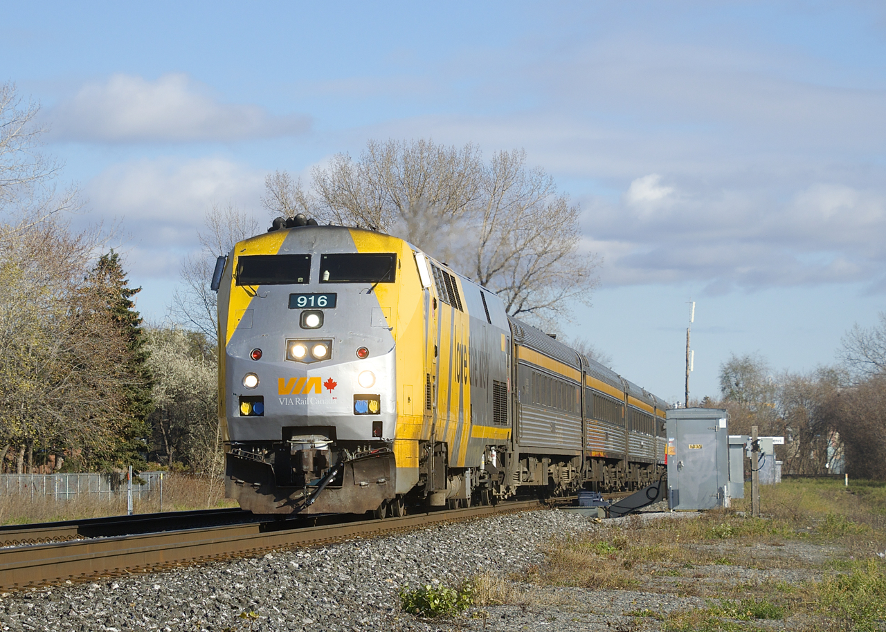 VIA 65 has VIA 916 and four HEP cars as it continues towards its next stop at Dorval.