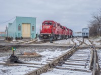 TH11 makes a few moves around National Steel Car gathering up a few cuts of new CP grain hoppers.  They'll be on their way soon and the two NSC yards crews will be back to work.