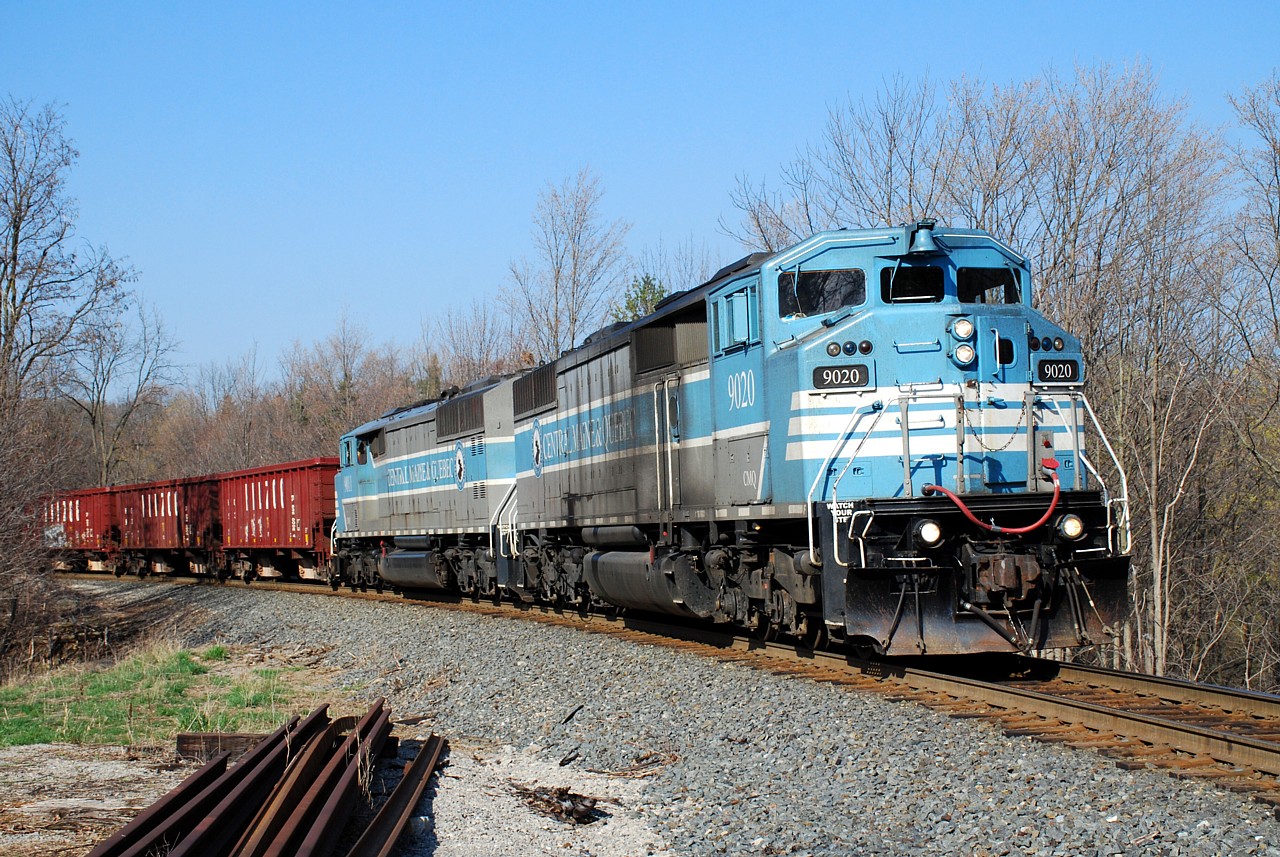 "Well, that was the shot of the year!" I recall thinking to myself after taking this photo back in April.  It was early in the year to make such a prediction, but now that we've reached the end of 2021, I can safely say this was my favourite photo of 2021.  A great consist, in perfect light, at a favourite location.  You can't ask for much more.  There were surprisingly many out to photograph this train on a Tuesday.  The pandemic-delayed March break was moved to this week in April and I was on vacation, so the operation of this ballast train dumping ballast on the Hamilton Subdivision couldn't have been timed better for me.  Here's to a happier 2022!  Let's see your favourite photos of 2021.