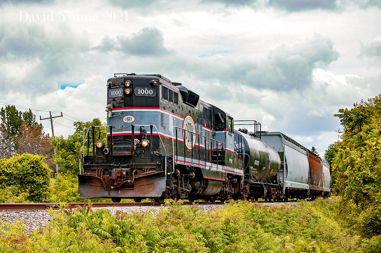 With the final chapter closing on this rail line, it's time to take a look back through it's era's. My run in's with this line came during the "Cando Era" throughout the early 2000's. Little did I know at the time this would be my last time chasing the line and my last time catching the old girl powering a train along the line. In this image CCGX  GP9 1000 is approaching Olde Baseline Road crossing just south of the hamlet of Inglewood, rolling through the Caledon Country Club on it's northbound journey back to Orangeville. CCGX 1000 would be replaced by GP9RM 4009 later this summer and made her final run November 1, 2008 heading up the northbound run of a Credit Valley Explorer excursion. She would be put into storage for a couple years before being reactivated working a spur line in Bath, Ontario. After her retirement she was sent to the CEMR deadline in Winnipeg, MB where she continues to languish until 2021. Disposition unknown as of the writing of this- likely scrapped.